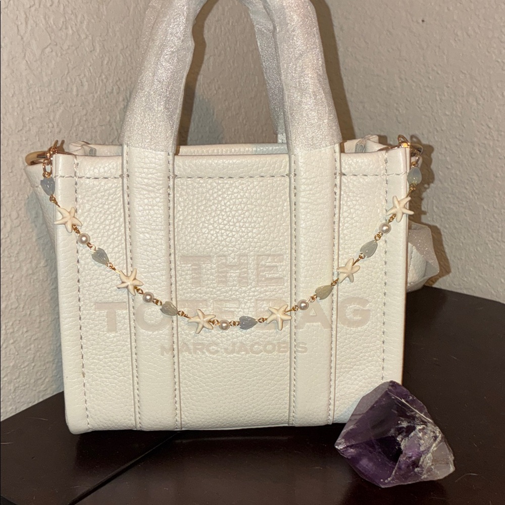 Gold Hawaiian Purse Lei With Starfish Pearl and Pikake